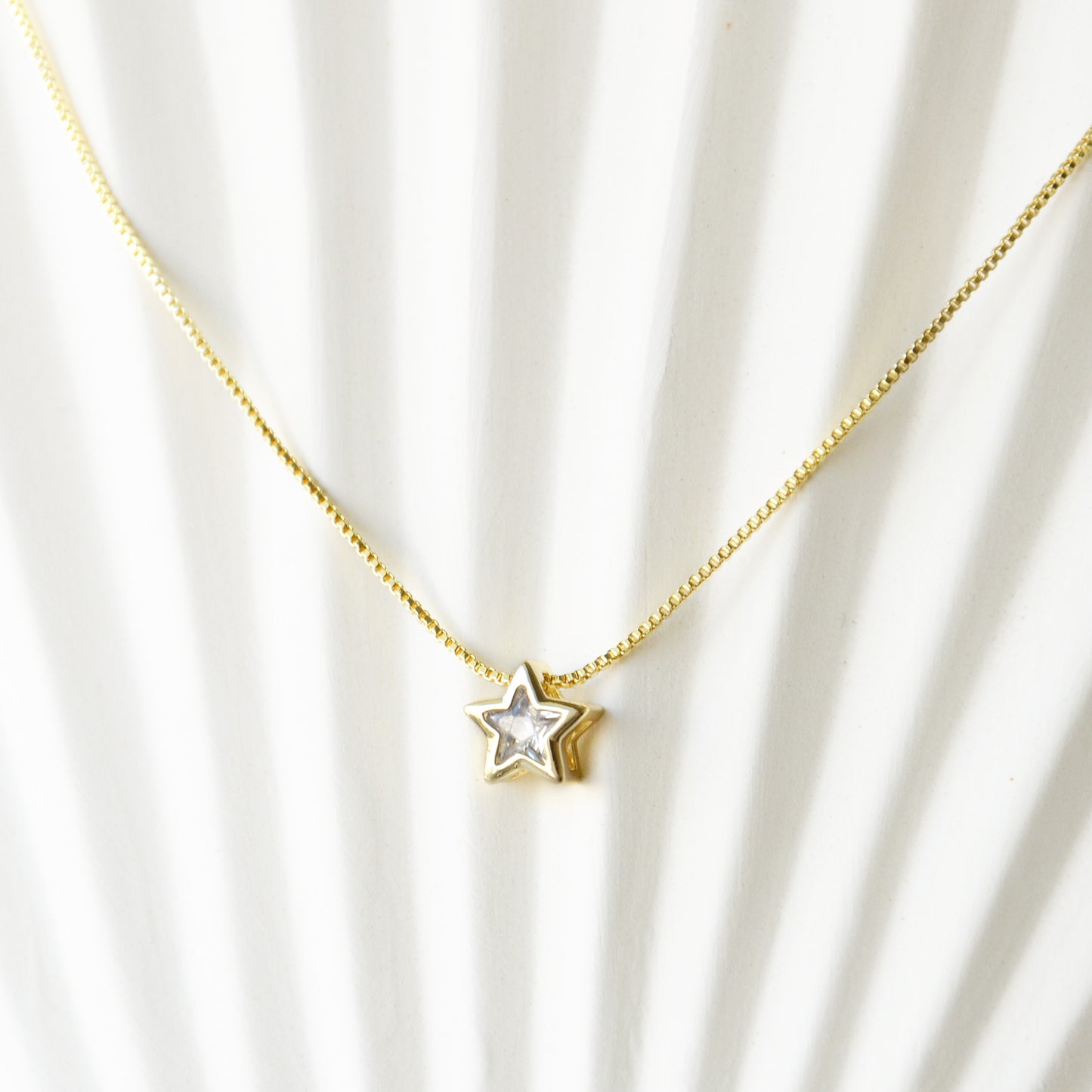 Cadena Punto Luz Estrella Circón - Enchape Oro 21k
